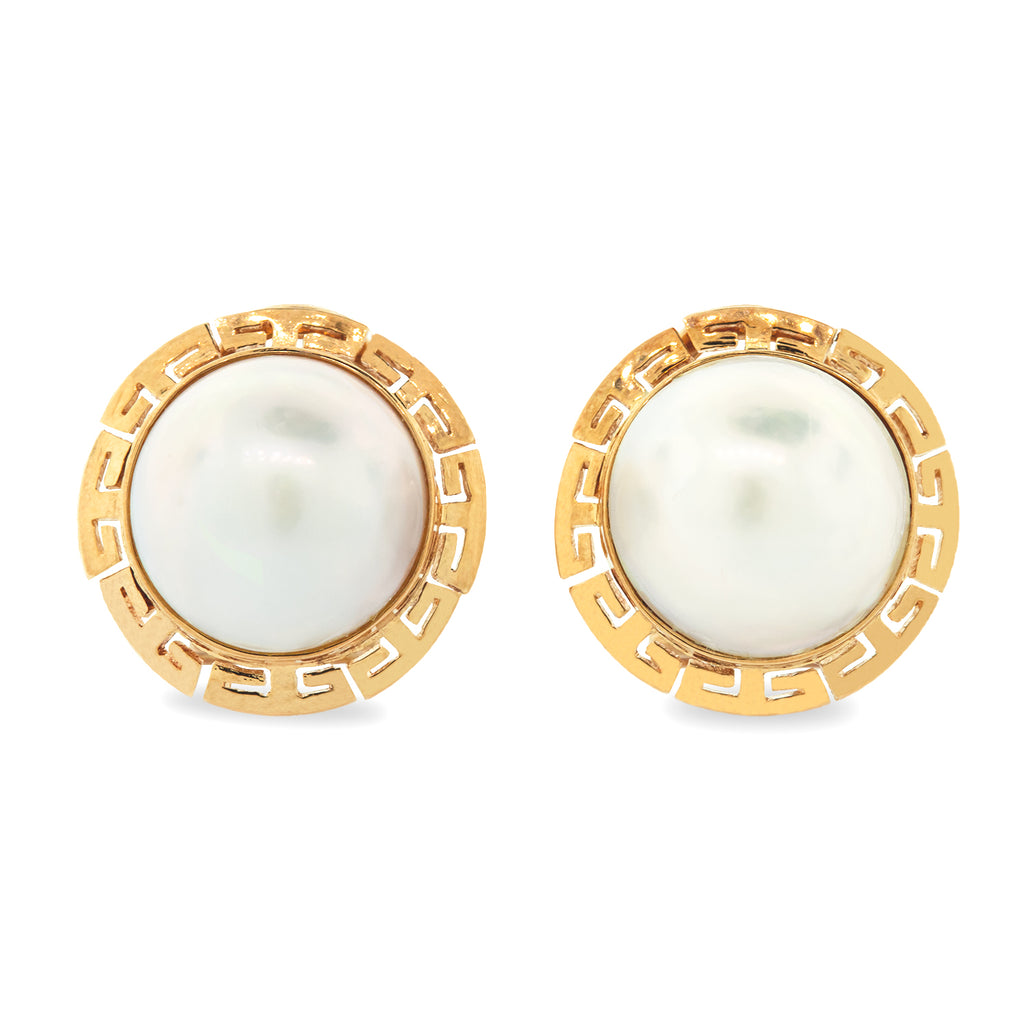 Aretes media perla y grecas