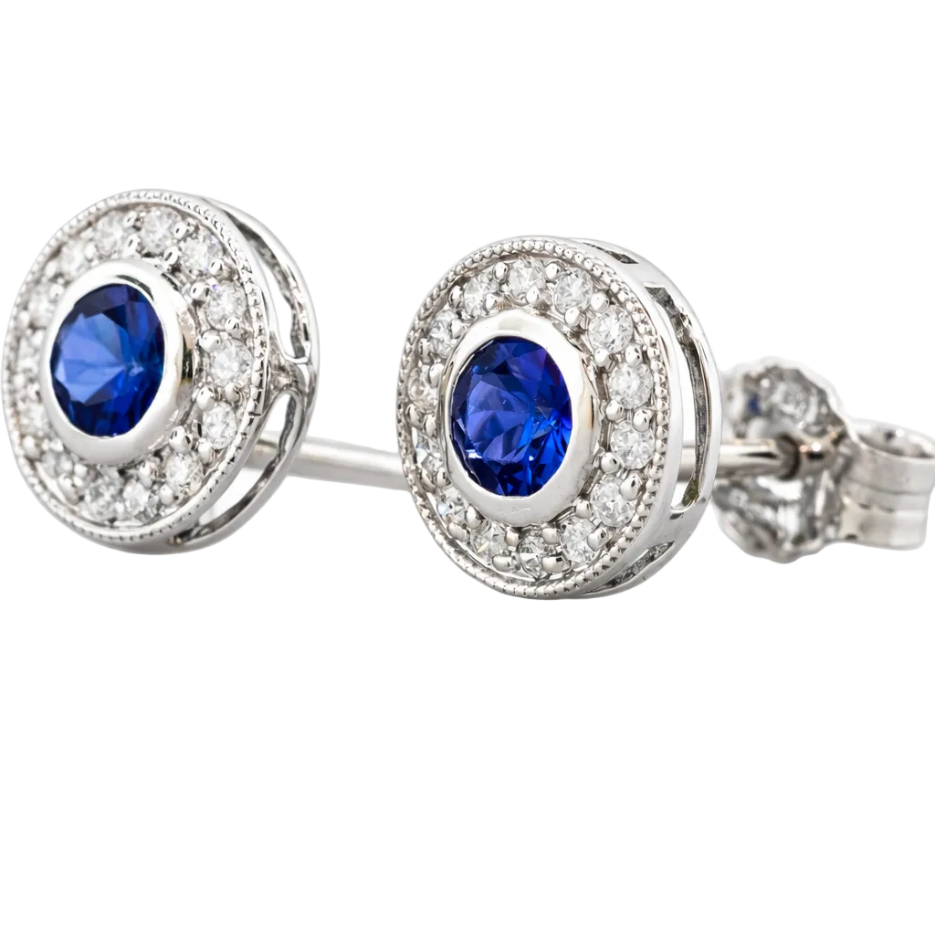 Broqueles con zafiro central en oro blanco con diamantes