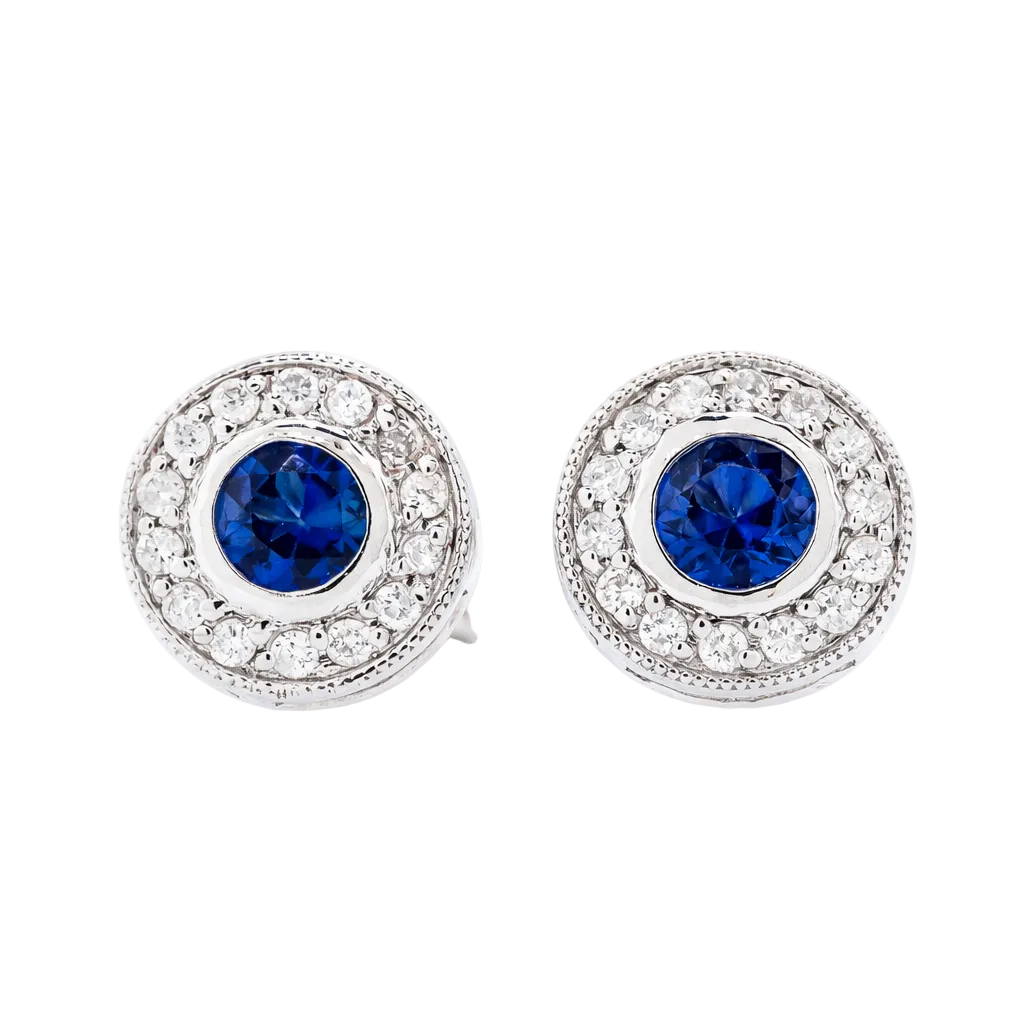 Broqueles con zafiro central en oro blanco con diamantes