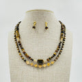 Set de collar doble y aretes  de piedras
