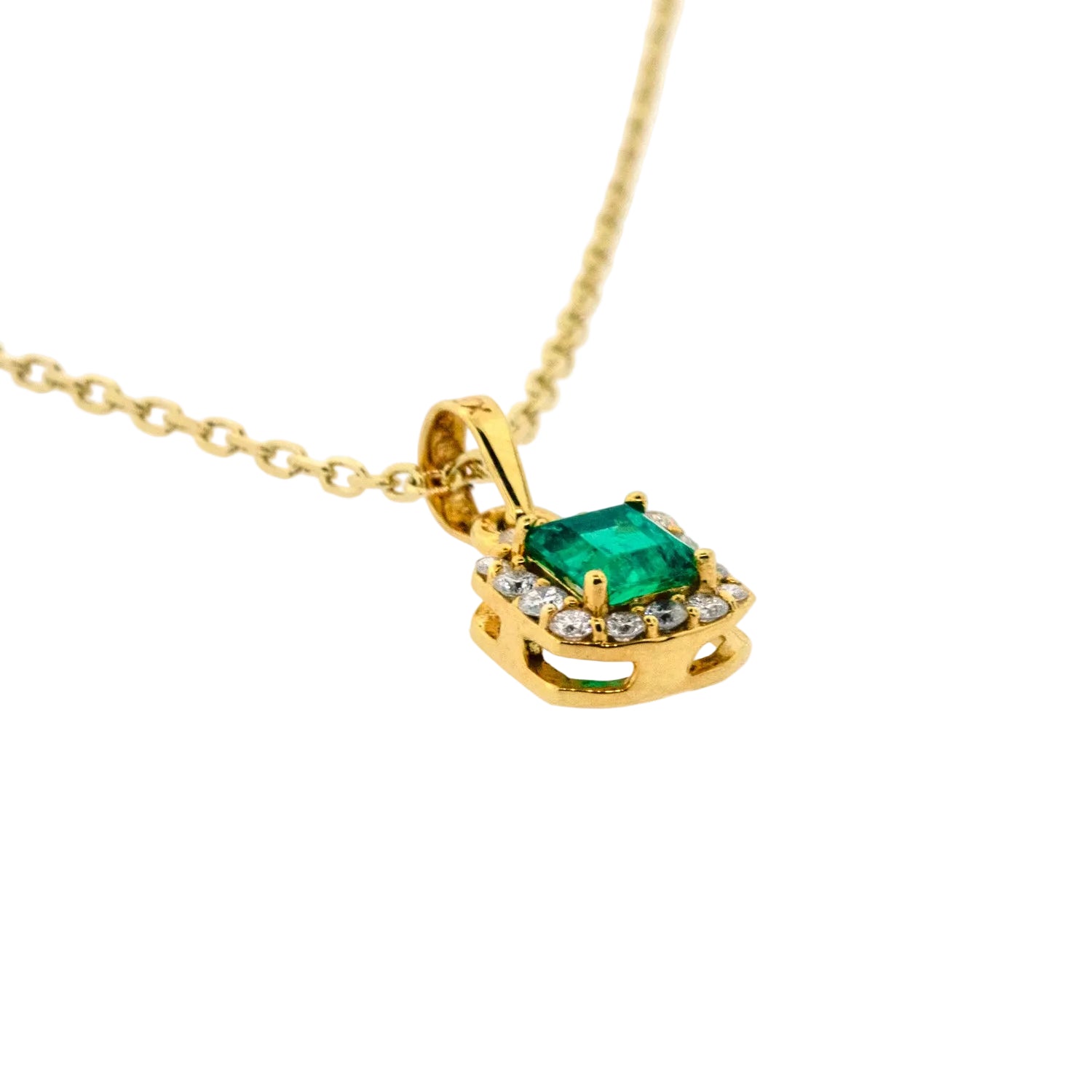 Dije de esmeralda con diamantes