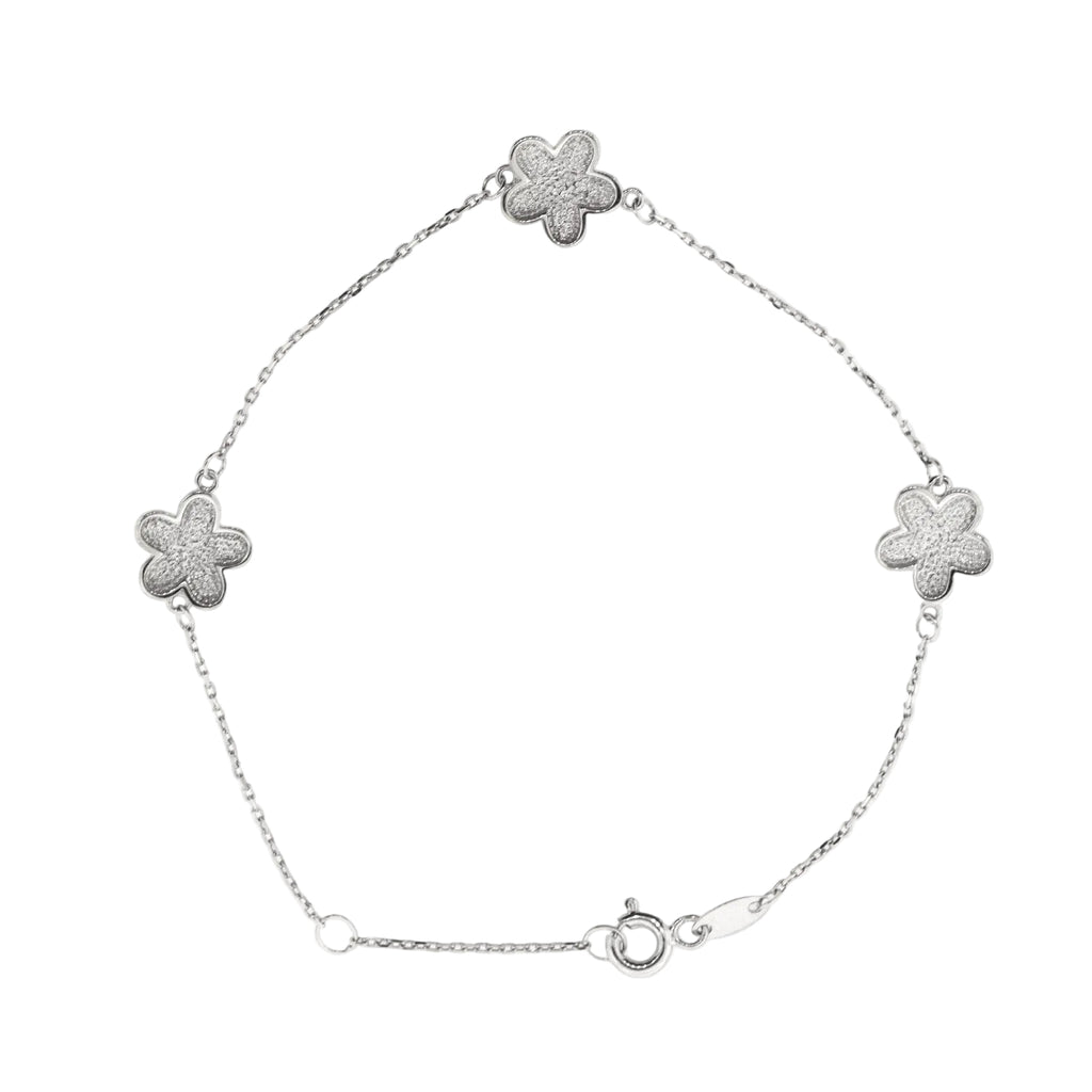 Pulso flores oro blanco